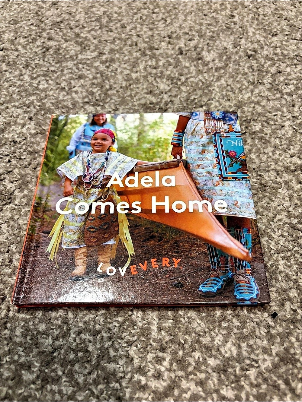 Lovevery Adela Comes Home Children's Photography Book